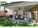 Inviting covered patio with stylish chairs offers a relaxing outdoor living space at 308 Furches St, Raleigh, NC 27607