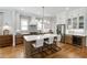 Modern kitchen featuring a large island, stainless steel appliances, and custom cabinetry at 308 Furches St, Raleigh, NC 27607