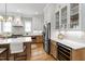 Modern kitchen with stainless steel appliances, custom cabinetry, and a built-in wine cooler at 308 Furches St, Raleigh, NC 27607
