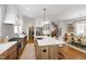 Kitchen with a large island, gas range, stainless steel appliances and walk-in pantry at 308 Furches St, Raleigh, NC 27607