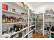 Walk-in pantry with ample shelving for storage and organization at 308 Furches St, Raleigh, NC 27607