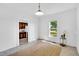 Bright living room with window and doorway view into the kitchen at 310 Chicopee Rd, Benson, NC 27504