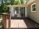 Inviting outdoor deck and screened in porch, perfect for relaxing and entertaining guests at 312 Heidinger Dr, Cary, NC 27511