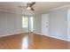 Cozy bedroom with hardwood floors, neutral walls, and closet space at 312 Heidinger Dr, Cary, NC 27511