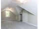 Image shows a finished attic bedroom with a window and a closet at 312 Heidinger Dr, Cary, NC 27511