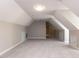 Spacious bonus room with neutral colored walls, white trim and carpet at 312 Heidinger Dr, Cary, NC 27511
