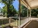 View from the porch showcasing the manicured lawn and neighborhood trees at 312 Heidinger Dr, Cary, NC 27511