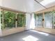 Sunroom with large windows offering beautiful outdoor views and natural light at 312 Heidinger Dr, Cary, NC 27511