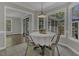 Inviting breakfast nook with views of the backyard at 3204 Peachford Ln, Raleigh, NC 27616