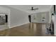 Bright and airy living room with hardwood floors and fireplace feature at 3204 Peachford Ln, Raleigh, NC 27616