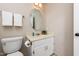 The clean bathroom features a modern vanity, providing ample storage and a touch of elegance at 3301 Manor Ridge Dr, Raleigh, NC 27603