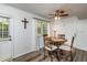 Cozy dining area featuring a round table with seating, bright window and modern decor at 3301 Manor Ridge Dr, Raleigh, NC 27603