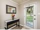 Inviting foyer with table and decorated mirror at 3301 Manor Ridge Dr, Raleigh, NC 27603