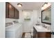 Convenient laundry area with modern appliances and storage, making laundry days a breeze at 3301 Manor Ridge Dr, Raleigh, NC 27603