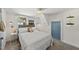 Cozy bedroom featuring a queen bed, carpet and natural light from a window at 3704 Swann St, Raleigh, NC 27612