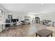 Spacious, naturally-lit bonus room features hardwood floors and flexible arrangement options at 3704 Swann St, Raleigh, NC 27612