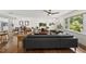 Cozy living room featuring hardwood floors, natural light, and neutral paint colors at 3704 Swann St, Raleigh, NC 27612