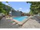 Backyard featuring a pool, deck, and outdoor seating area at 3704 Swann St, Raleigh, NC 27612