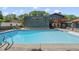 Backyard featuring a rectangular pool, deck, and outdoor seating area at 3704 Swann St, Raleigh, NC 27612