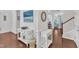Elegant foyer with hardwood floors, wainscoting, and a view into the adjacent living spaces at 3801 Althorp Dr, Raleigh, NC 27616