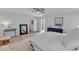 Bright main bedroom features a ceiling fan and access to a bathroom at 3801 Althorp Dr, Raleigh, NC 27616