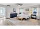 Bright main bedroom features a ceiling fan and two dressers at 3801 Althorp Dr, Raleigh, NC 27616