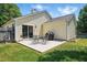 Backyard patio area with furniture and grill, perfect for outdoor entertaining and relaxation at 3808 Hopper St, Raleigh, NC 27616