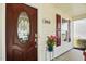 Close-up of front door with decorative glass, house number, and red shutters at 3808 Hopper St, Raleigh, NC 27616