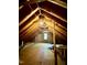 Unfinished attic space with exposed rafters at 404 Cary Pines Dr, Cary, NC 27513