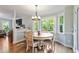 Dining area with backyard view and hardwood flooring at 404 Cary Pines Dr, Cary, NC 27513