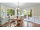 Cozy dining area with large windows and a patio door at 404 Cary Pines Dr, Cary, NC 27513