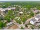 Aerial shot featuring a neighborhood with a beautiful green park at 411 Flat Rail Trl, Cary, NC 27511