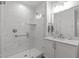 Modern bathroom featuring a glass-enclosed shower and vanity with white cabinets at 411 Flat Rail Trl, Cary, NC 27511