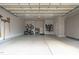 Spacious garage with epoxy floors and ample storage at 411 Flat Rail Trl, Cary, NC 27511