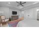 Spacious bedroom with hardwood floors, ceiling fan, and walk in closet at 411 Flat Rail Trl, Cary, NC 27511