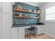 Stylish home office with custom built-ins and floating shelves at 411 Flat Rail Trl, Cary, NC 27511