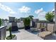 Relaxing rooftop deck featuring lounge chairs, stylish plants, and an open-air feel at 411 Flat Rail Trl, Cary, NC 27511