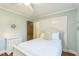 Well decorated bedroom with warm natural light and ceiling fan at 418 S 2Nd St, Smithfield, NC 27577