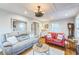 Inviting living room features a comfortable seating arrangement, hardwood floors and lots of natural light at 418 S 2Nd St, Smithfield, NC 27577