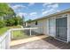 The back deck features sliding glass doors and overlooks a spacious yard at 43 Columbus Ct, Spring Lake, NC 28390