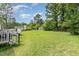 This large backyard with deck access is perfect for outdoor entertaining at 43 Columbus Ct, Spring Lake, NC 28390