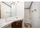 Bathroom with a sink and vanity, a large mirror, and a bathtub and shower combination, with a towel rack at 43 Columbus Ct, Spring Lake, NC 28390