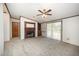 Inviting living room featuring a cozy fireplace, sliding glass door access to the outdoor area at 43 Columbus Ct, Spring Lake, NC 28390