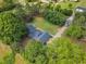 An aerial view displays a home with lush greenery and road access at 4314 Hopkins Rd, Middlesex, NC 27557