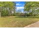 The expansive backyard has a playground and a view of the tree line at 4314 Hopkins Rd, Middlesex, NC 27557
