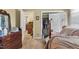 The bedroom has ample space, an ensuite and a view into other rooms at 4314 Hopkins Rd, Middlesex, NC 27557