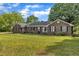 Traditional brick home with shutters and manicured landscaping at 4314 Hopkins Rd, Middlesex, NC 27557