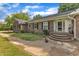 Charming brick home features a well maintained yard at 4314 Hopkins Rd, Middlesex, NC 27557