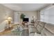 This living room offers neutral walls, carpet flooring, a view of the front yard, and ample space at 4314 Hopkins Rd, Middlesex, NC 27557