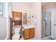 Functional bathroom with a vanity, a mirrored cabinet, and a shower with glass doors for easy access at 437 New Parkside Dr, Chapel Hill, NC 27516